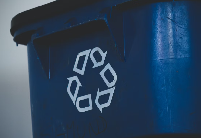 Blue recycle bin.