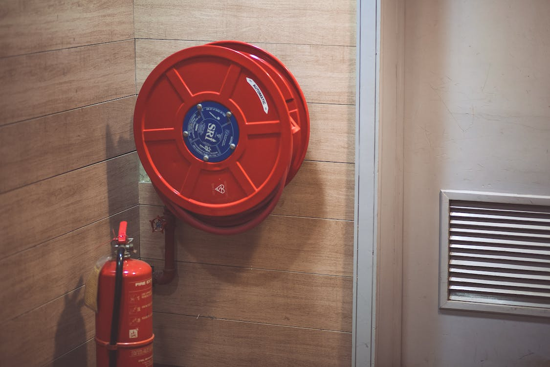 A fire extinguisher mounted on the wall