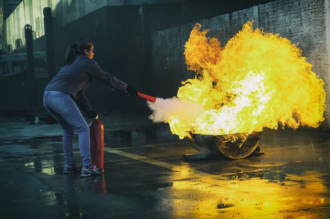 Person participating in a fire prevention strategy drill